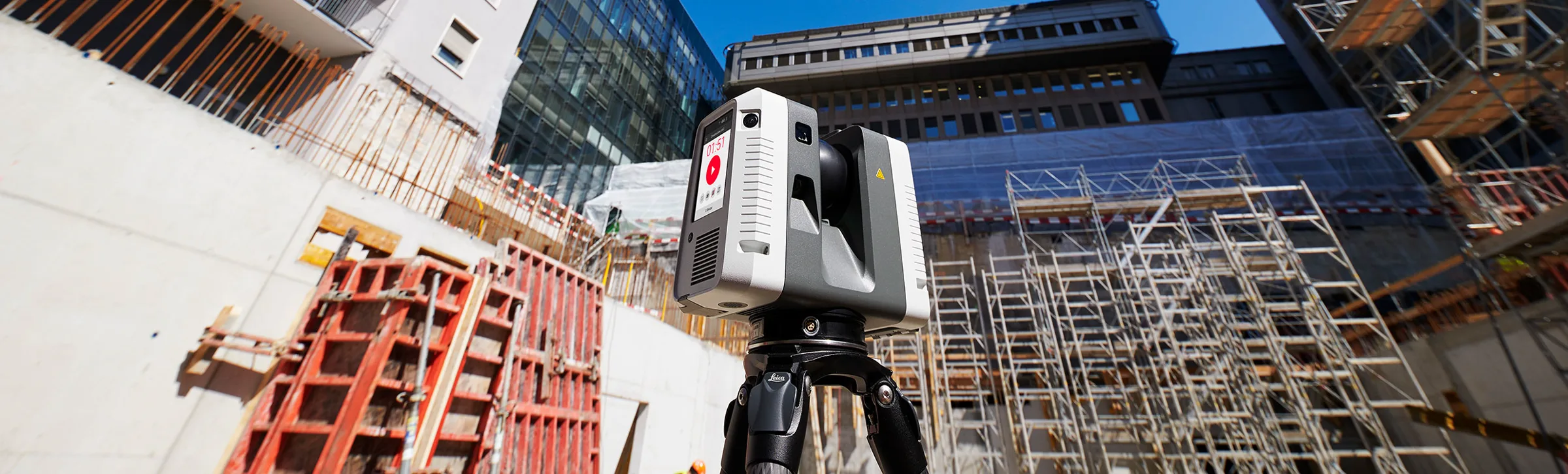 Leica RTC360 terrestrial laser scanner capturing a building under construction
